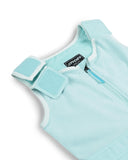 Light blue sleeveless top with a brand label on a white background