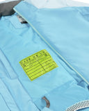 Light blue jacket with a yellow label on a white background