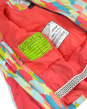 Close-up of a colorful jacket with labels and tags inside