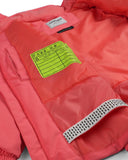 Close-up of a red jacket with a green label on a white background