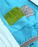 Close-up of a blue jacket with a green label and gray text on a white background