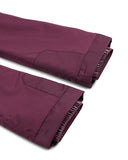 Folded maroon fabric on a white background