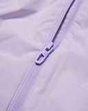 Close-up of a zipper on a light purple garment