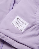 Close-up of a Spyder label on a purple garment