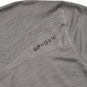 Close-up of a gray Spyder garment with embroidered logo.