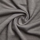 Close-up of gray textured fabric with a subtle pattern
