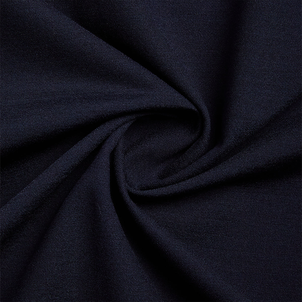 Close-up of dark blue fabric with folds