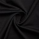 Close-up of black fabric with a textured pattern