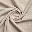 Close-up of beige textured fabric with a subtle pattern