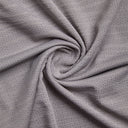 Close-up of gray textured fabric with a slight sheen
