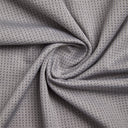 Close-up of gray textured fabric with a subtle pattern