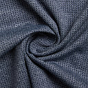 Close-up of textured blue fabric with a subtle pattern