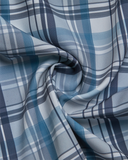 Close-up of blue and gray plaid fabric